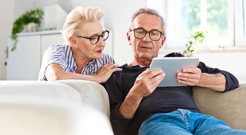 A couple studying their IRA for retirement planning