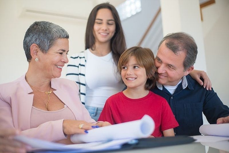 A family meeting with a real estate agent to discuss home buying in California