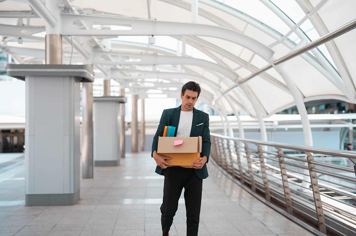 Businessman walking after being dismissed