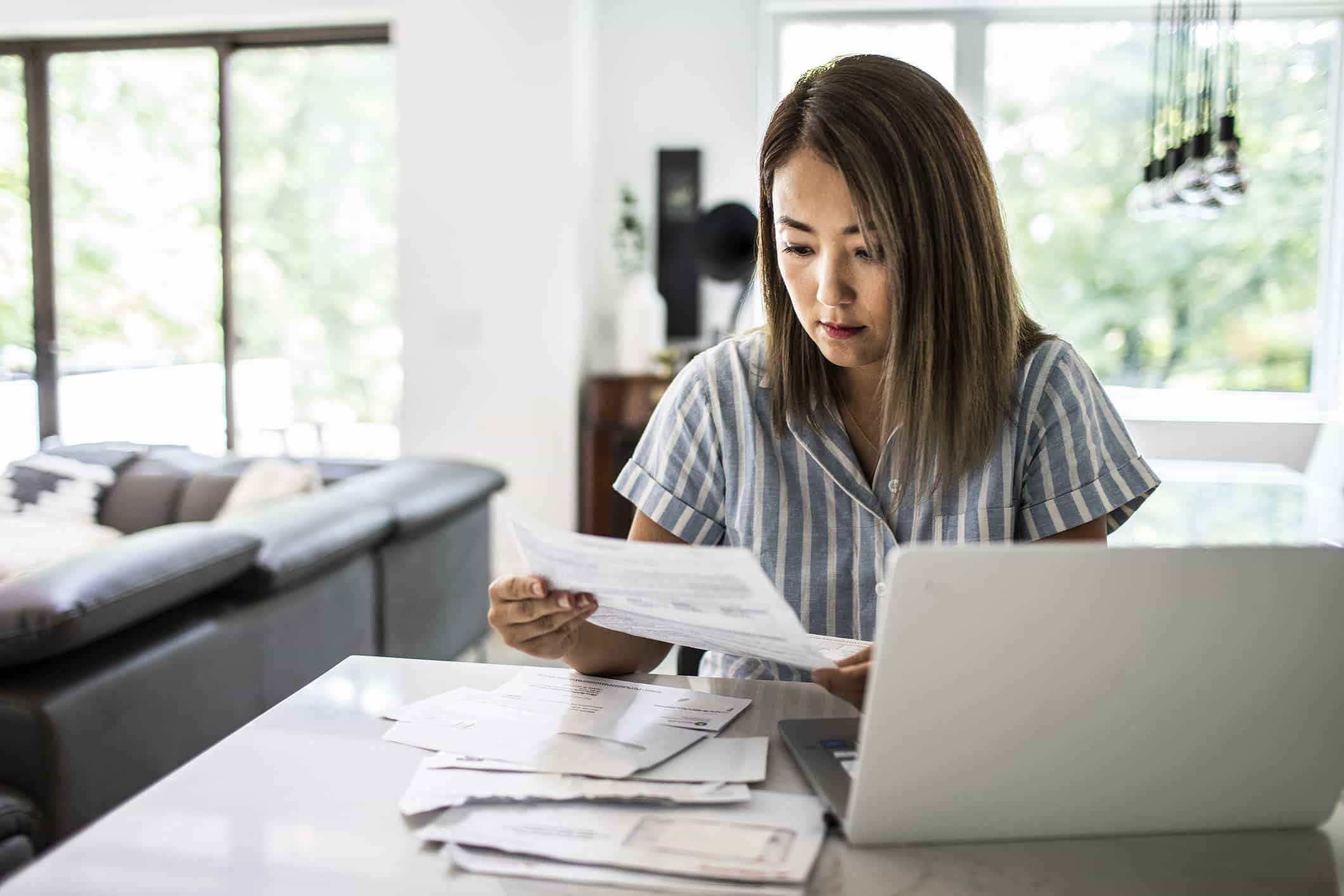 Woman paying her bills